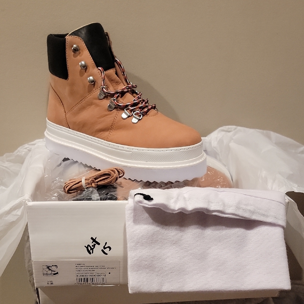Womens 8.5 SCHUTZ (NIB)  beige and black comes with dust bag and extra laces.
